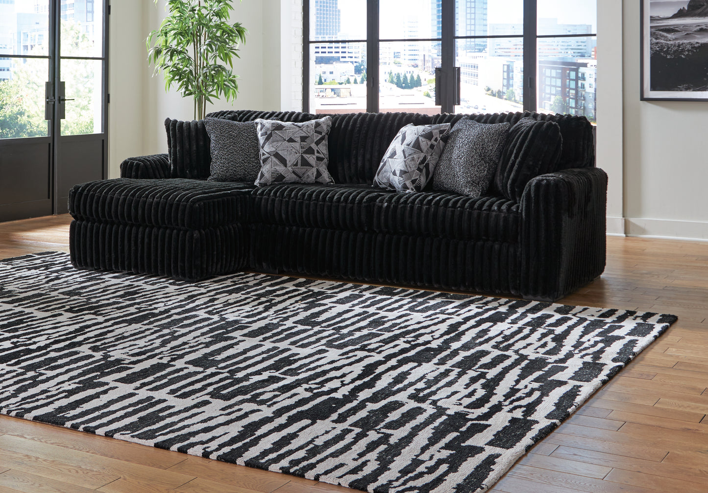 Cassel Furniture Outlet - Ashley Furniture - Midnight-Madness Sectional - RAF 2-Piece Sectional Sofa with Chaise / Onyx - 98103S1