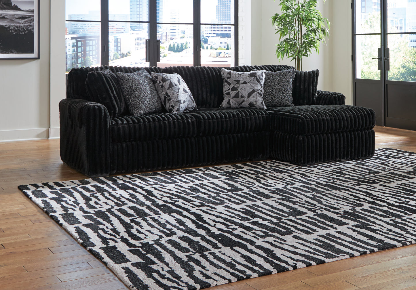 Cassel Furniture Outlet - Ashley Furniture - Midnight-Madness Sectional - LAF 3-Piece Sectional with Chaise / Onyx - 98103S9