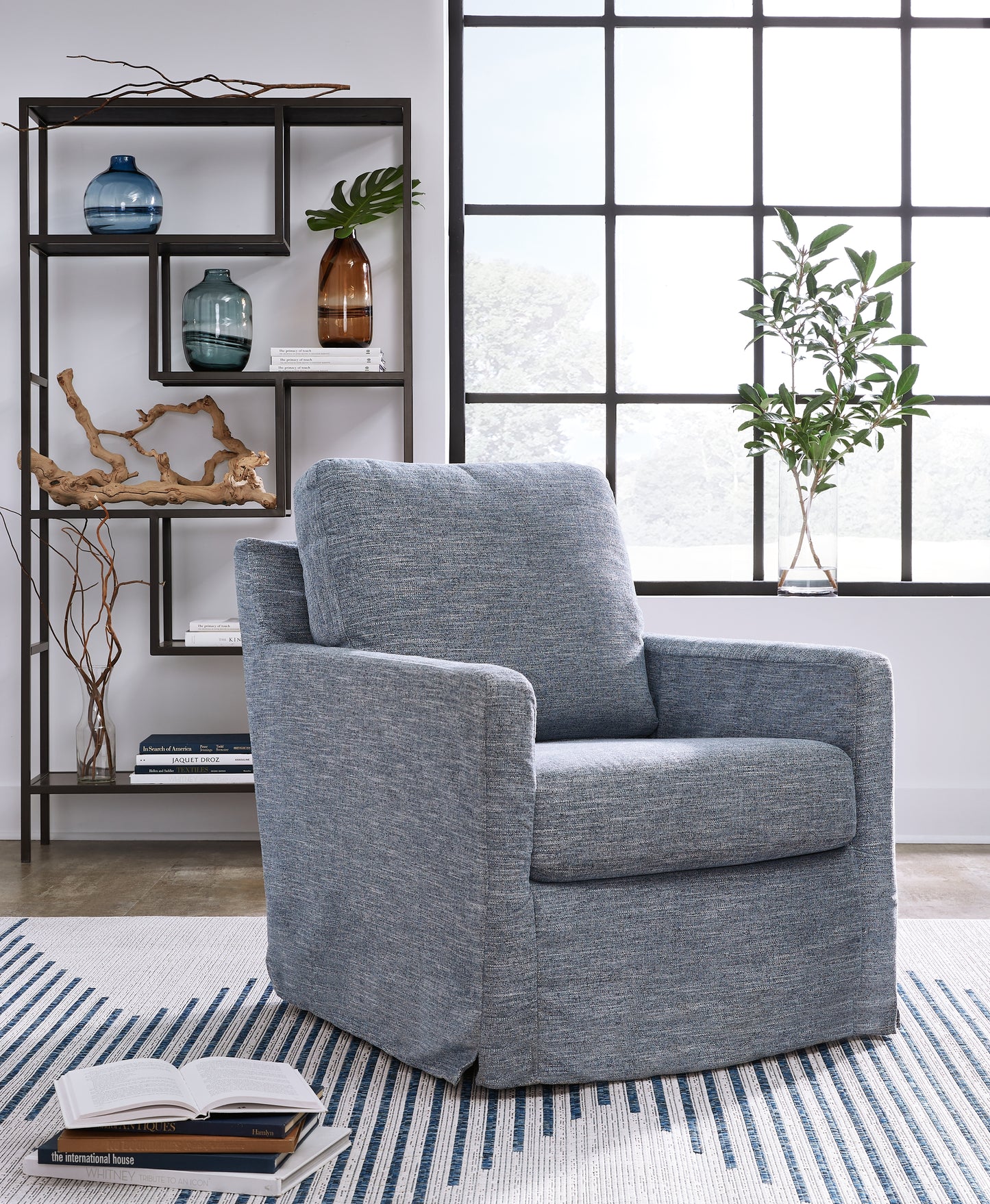 Cassel Furniture Outlet - Ashley Furniture - Nenana Next-Gen Nuvella Swivel Glider Accent Chair - Swivel Glider Accent Chair / Denim - A3000646