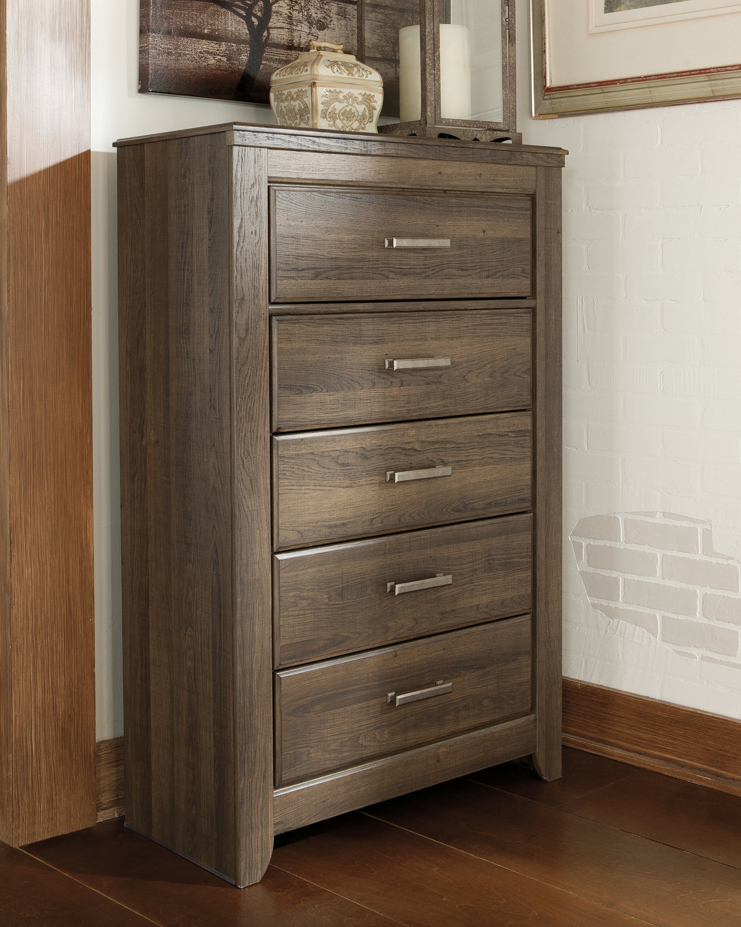 Cassel Furniture Outlet - Ashley Furniture - Juararo Bedroom - Five Drawer Chest / Dark Brown - B251-46