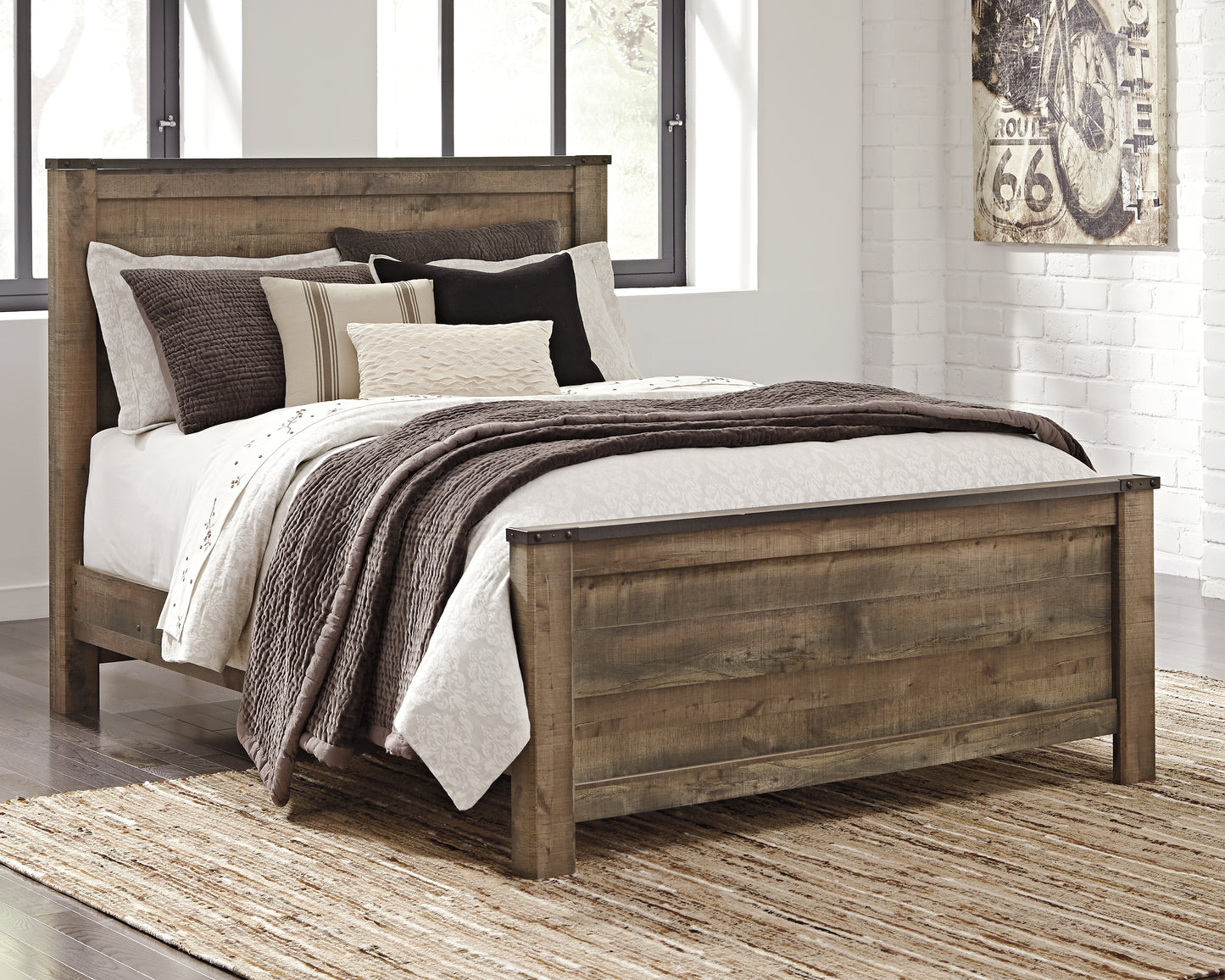 Cassel Furniture Outlet - Ashley Furniture - Trinell Bedroom - Queen Panel Bed / Brown - B446B11