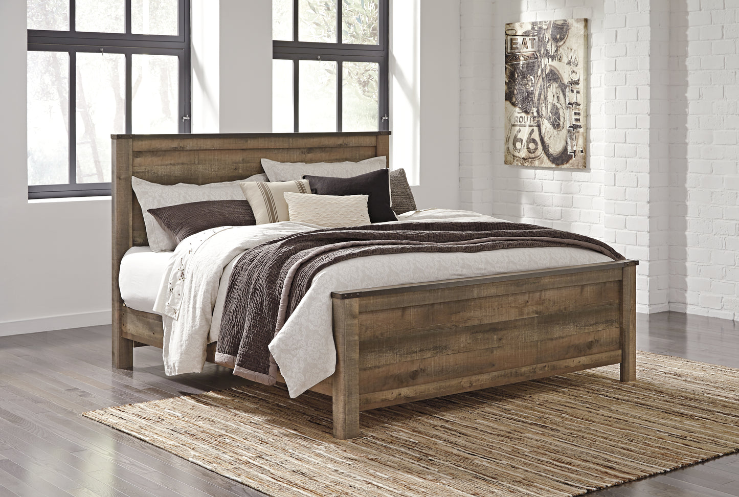Cassel Furniture Outlet - Ashley Furniture - Trinell Bedroom - King Panel Bed / Brown - B446B23