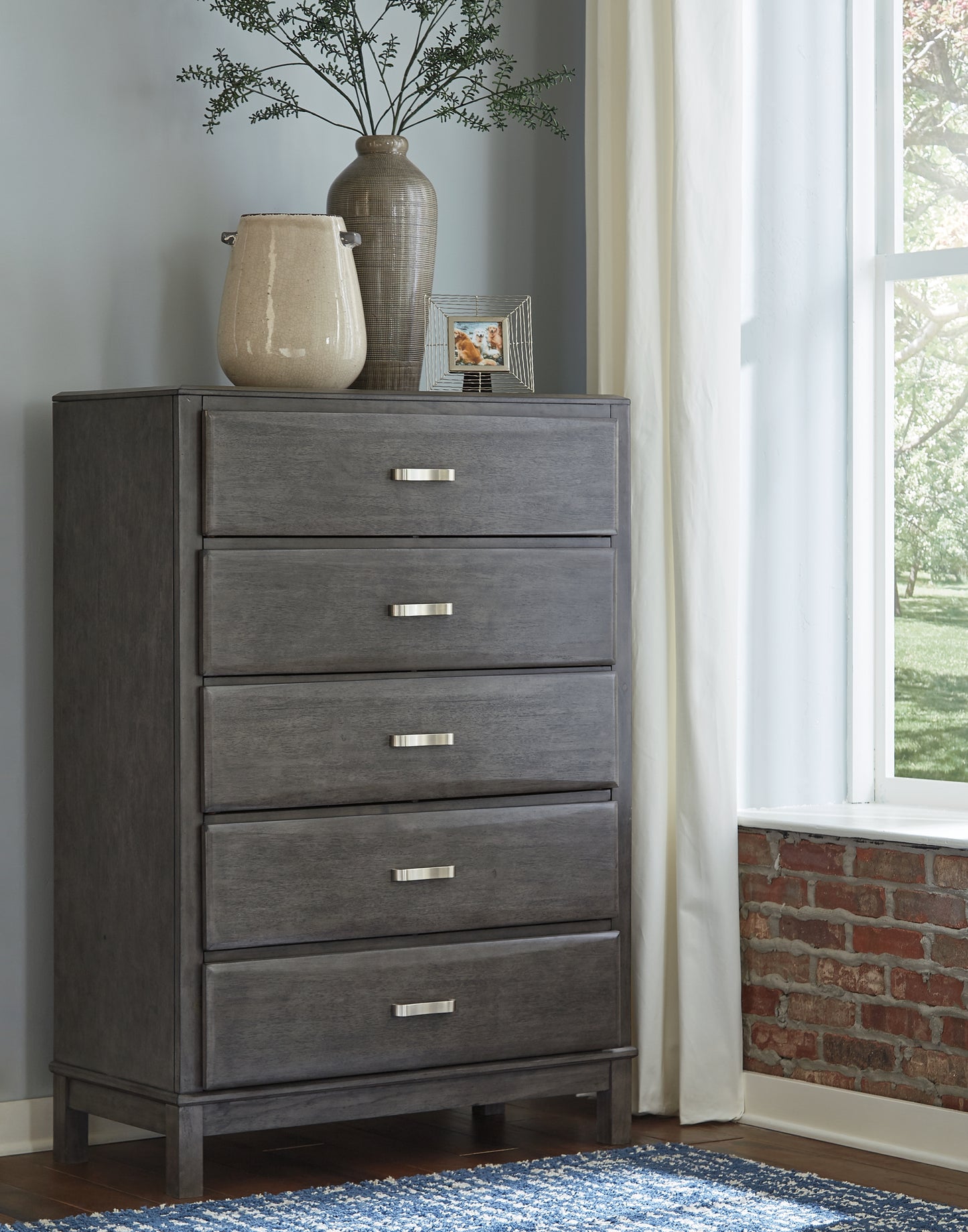 Cassel Furniture Outlet - Ashley Furniture - Caitbrook Bedroom - Five Drawer Chest / Gray - B476-46