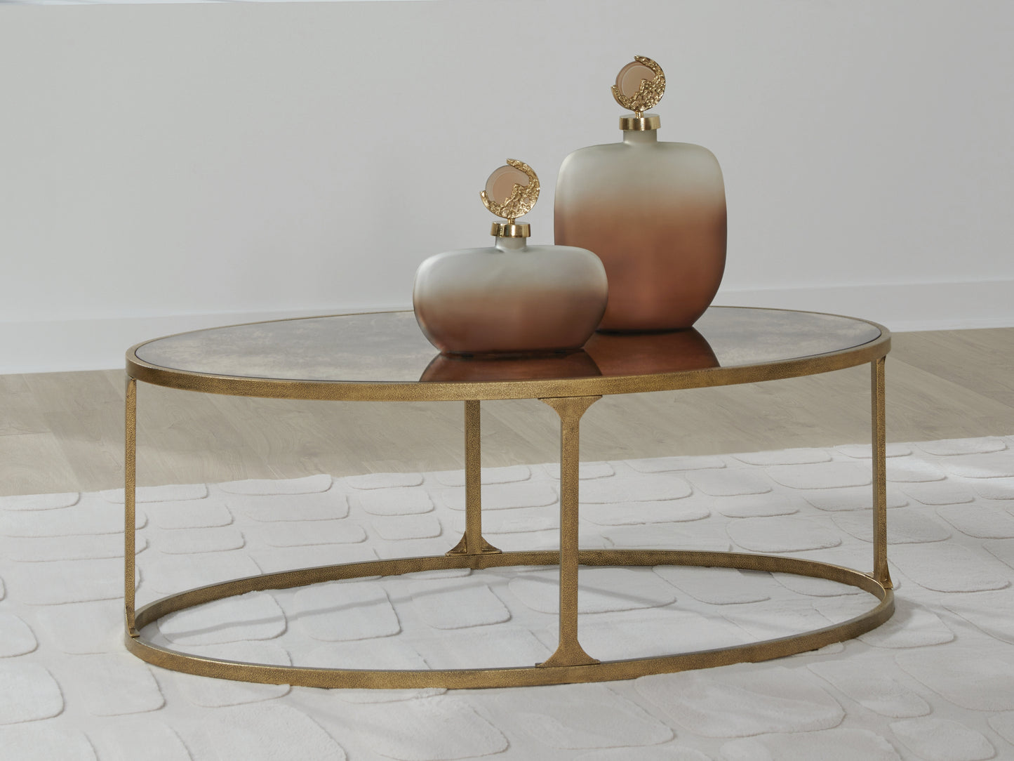 Cassel Furniture Outlet - Ashley Furniture - Korajane Coffee Table - Oval Cocktail Table / Antique Gold - T399-0