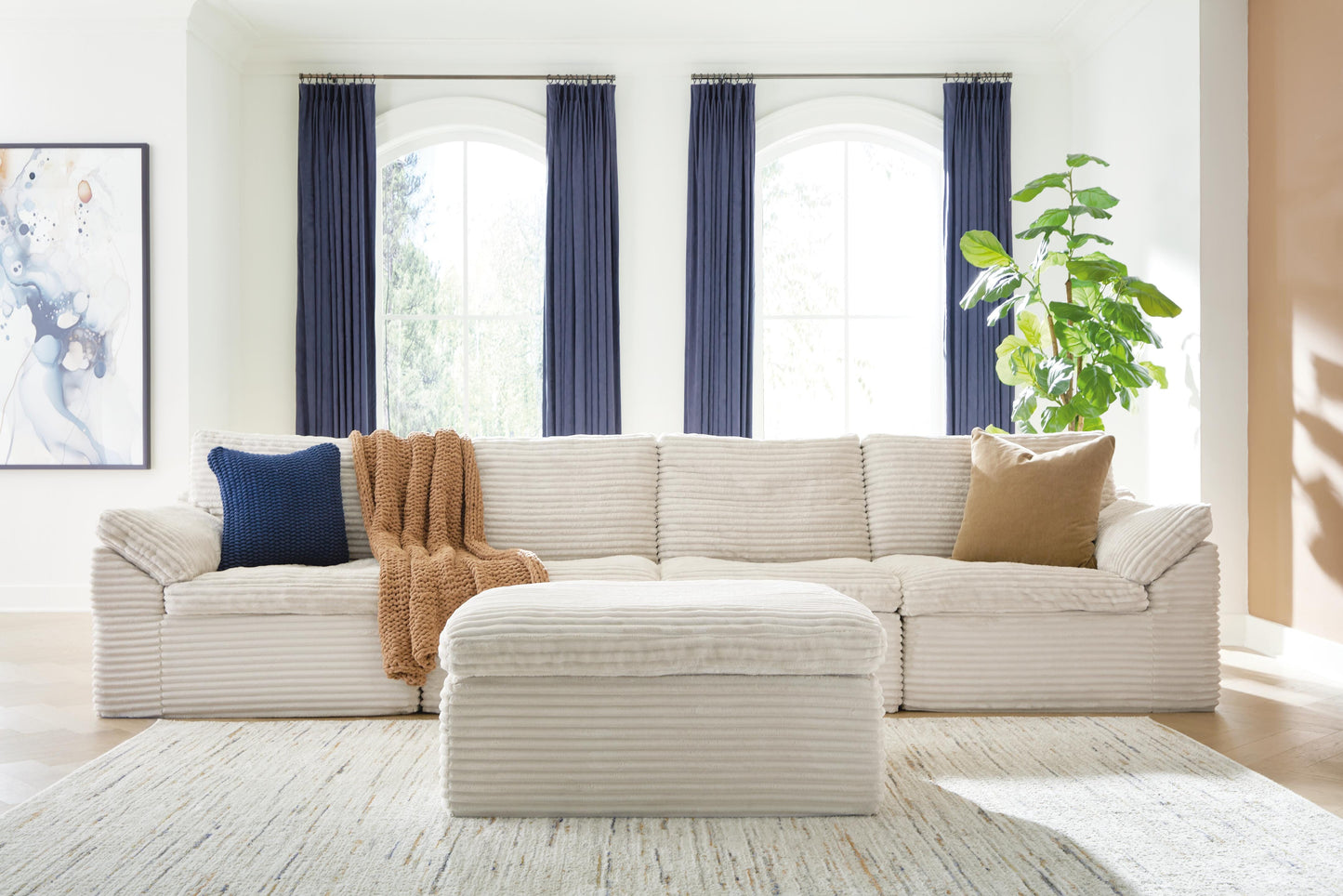 Cassel Furniture Outlet - Ashley Furniture - Fannin Sectional - RAF 4-Piece Sectional with Ottoman / Ivory - PC84304S1