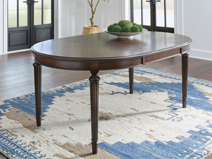 Cassel Furniture Outlet - Ashley Furniture - Lavinton Dining Room - Oval Dining Room EXT Table / Brown - D764-35
