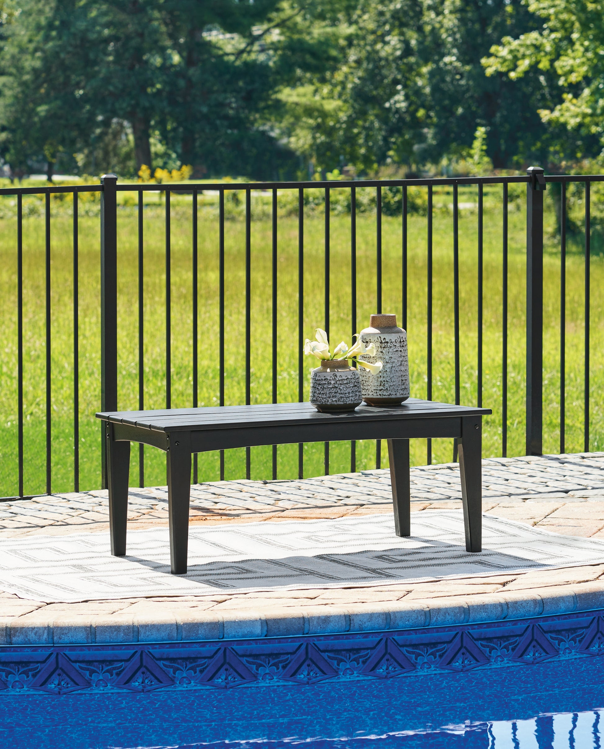 Cassel Furniture Outlet - Ashley Furniture - Hyland wave Outdoor - Rectangular Cocktail Table / Black - P108-701