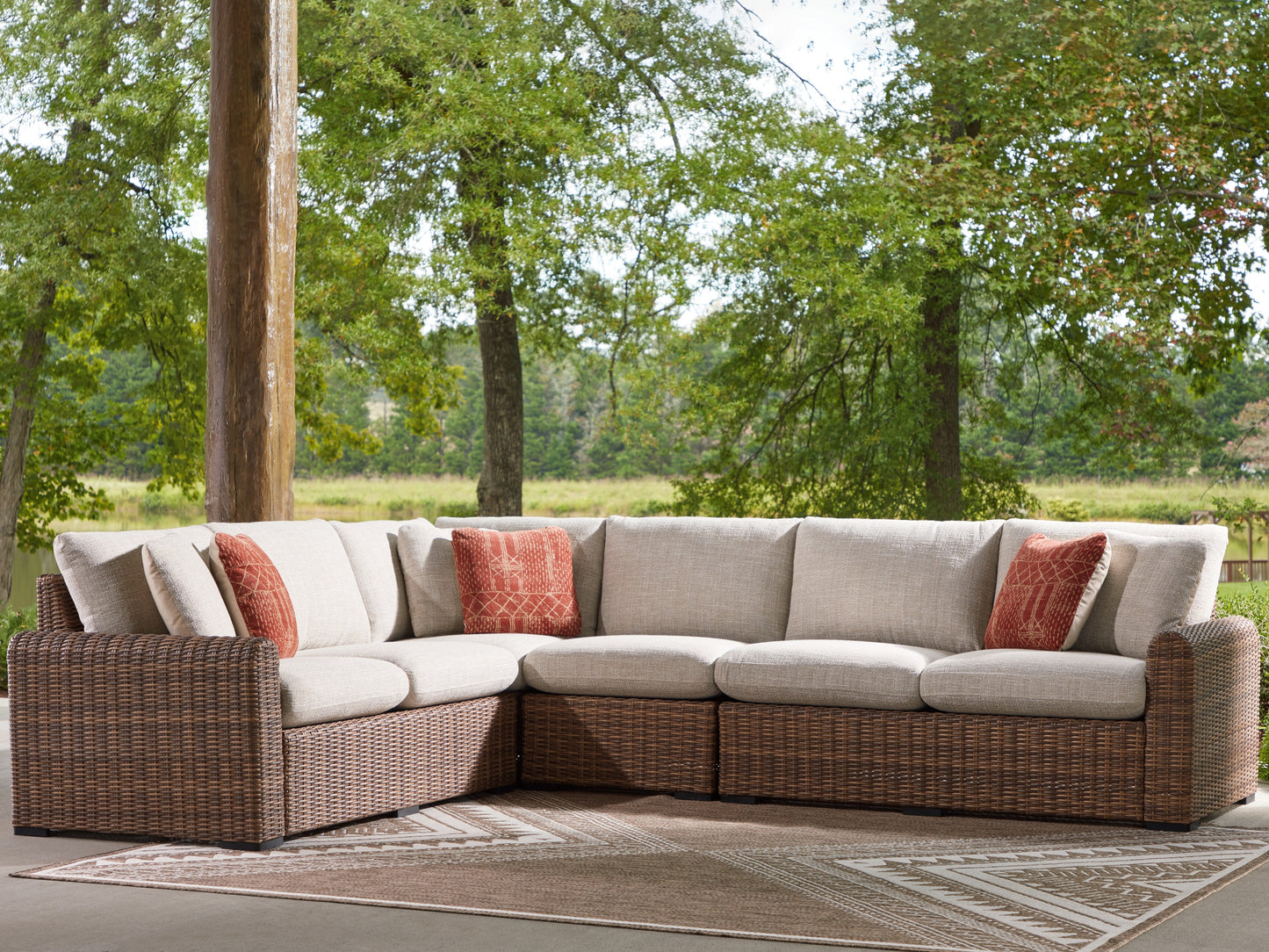 Cassel Furniture Outlet - Ashley Furniture - Dolan Creek Outdoor - 4-Piece Outdoor Sectional / Beige/Brown - PCP610P2