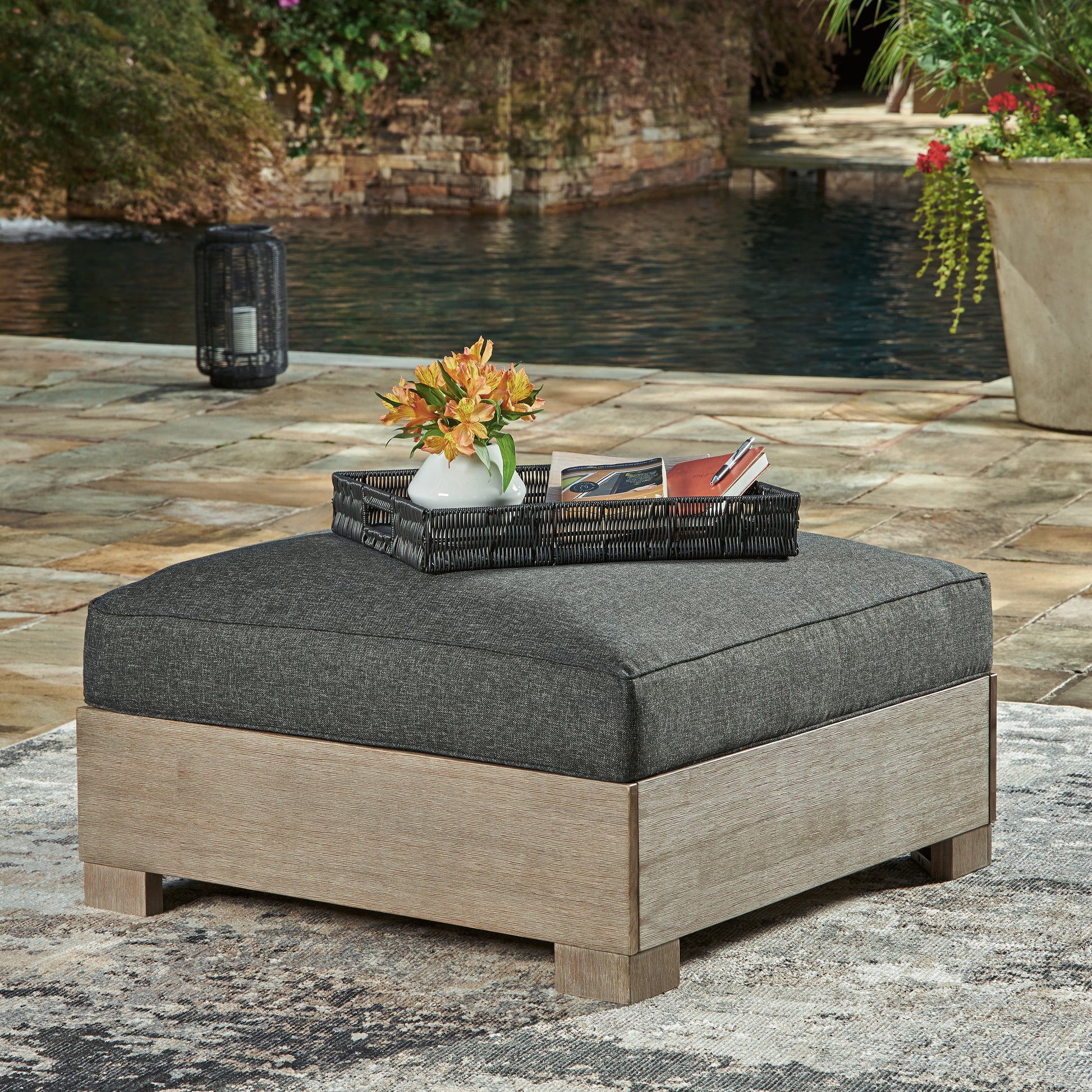 Cassel Furniture Outlet - Ashley Furniture - Citrine Park Outdoor - Ottoman with Cushion / Brown/Charcoal - P660-814