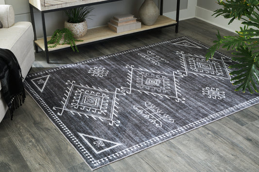 Cassel Furniture Outlet - Ashley Furniture - Arloman Rug - 5' x 7' Washable Rug / Black/Cream/Gray - R405932