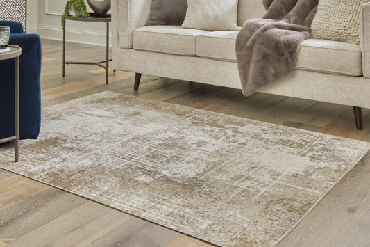 Cassel Furniture Outlet - Ashley Furniture - Grifflain Rug - 5'1" x 7' Washable Rug / Tan/Brown/Gray - R406232