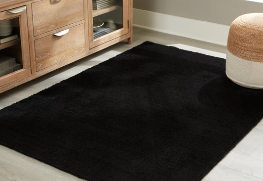 Cassel Furniture Outlet - Ashley Furniture - Anaben Rug - 8' x 10'1" Washable Rug / Black - R406311