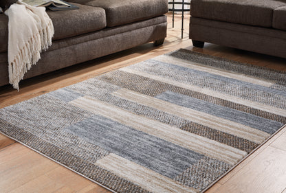 Cassel Furniture Outlet - Ashley Furniture - Sethburn Rug - 5' x 7' Rug / Cream/Brown/Gray - R406592