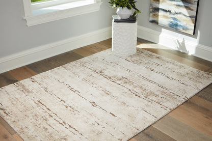 Cassel Furniture Outlet - Ashley Furniture - Kasney Rug - 5' x 7' Rug / Cream/Brown - R406852