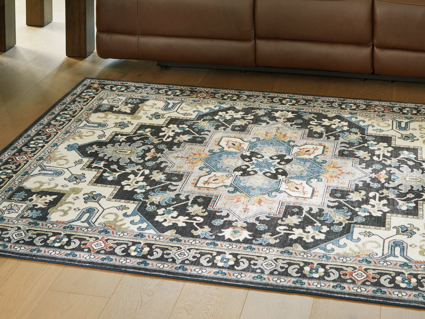 Cassel Furniture Outlet - Ashley Furniture - Leningston Rug - 5' x 7' Washable Rug / Black/Cream/Blue - R407062