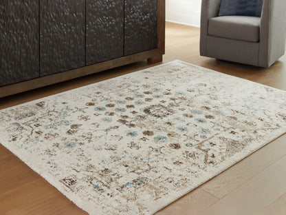 Cassel Furniture Outlet - Ashley Furniture - Jossler Rug - 5' x 7' Rug / Ivory/Brown/Teal - R407072