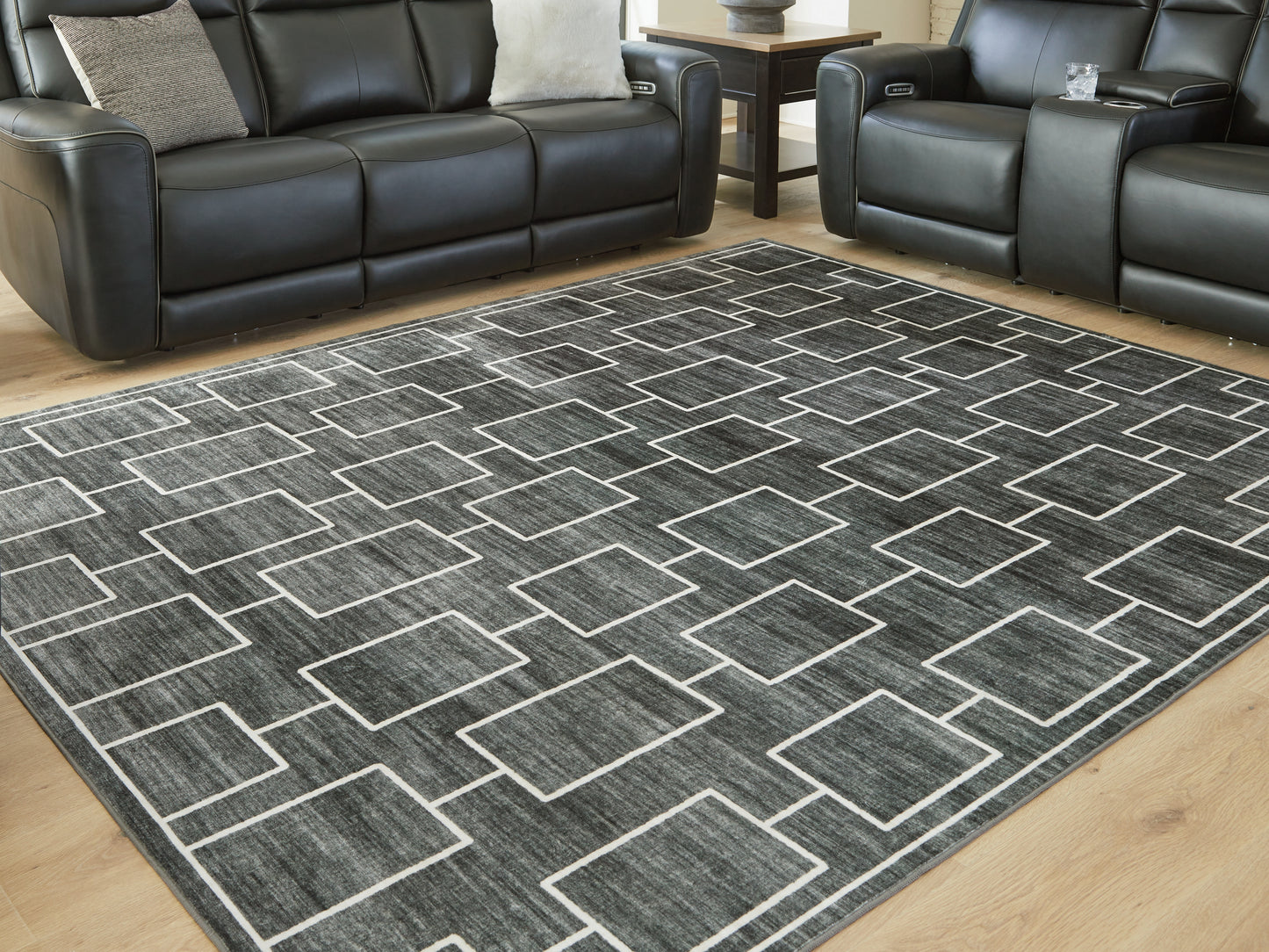 Cassel Furniture Outlet - Ashley Furniture - Elderland Rug - Washable 5' x 7' Area Rug / Black/Gray - R407402