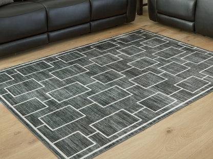 Cassel Furniture Outlet - Ashley Furniture - Elderland Rug - Washable 5' x 7' Area Rug / Black/Gray - R407402