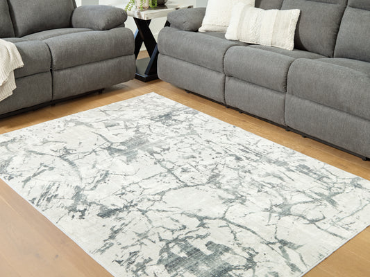 Cassel Furniture Outlet - Ashley Furniture - Tobinbury Rug - Washable 5' x 7' Area Rug / Gray - R407422