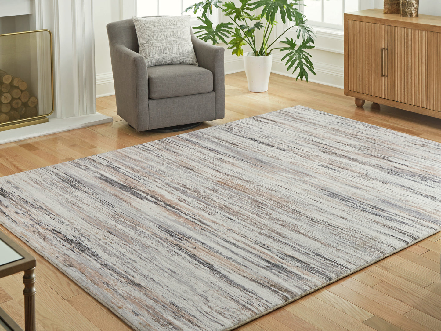 Cassel Furniture Outlet - Ashley Furniture - Nace Rug - 7'6" x 9'6" Area Rug / Gray/Brown/White - R407471