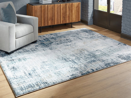 Cassel Furniture Outlet - Ashley Furniture - Arlenmont Rug - 7'6" x 9'6" Area Rug / Blue/White/Brown - R407481