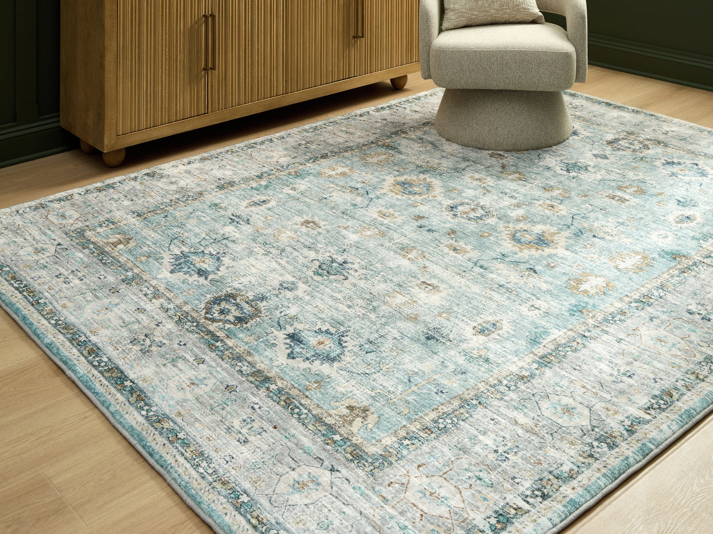Cassel Furniture Outlet - Ashley Furniture - Ladstoney Rug - 7'6" x 9'6" Area Rug / Teal/Beige/Ochre - R407501