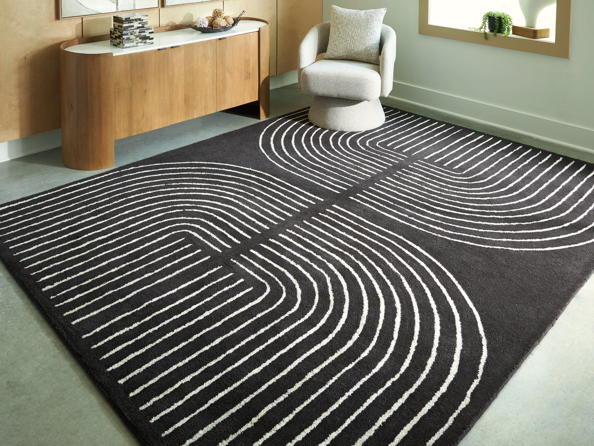 Cassel Furniture Outlet - Ashley Furniture - Eldonmore Rug - 7'8" x 10' Area Rug / Black/Ivory - R407571