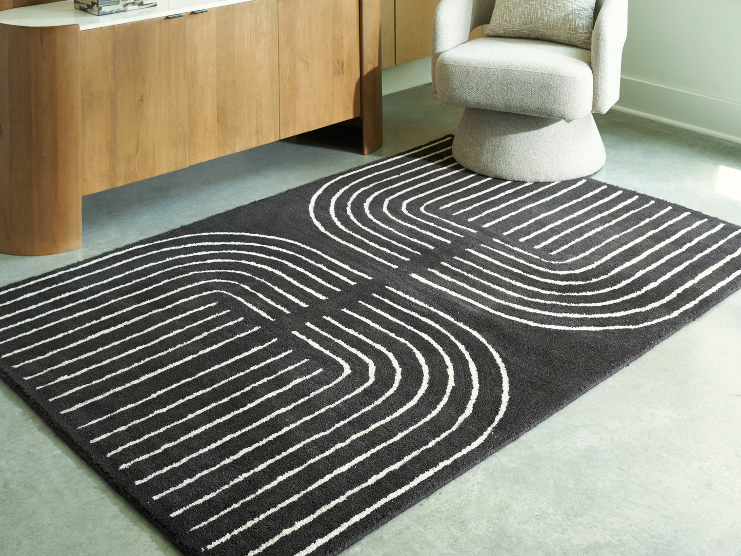 Cassel Furniture Outlet - Ashley Furniture - Eldonmore Rug - 5' x 7' Area Rug / Black/Ivory - R407572