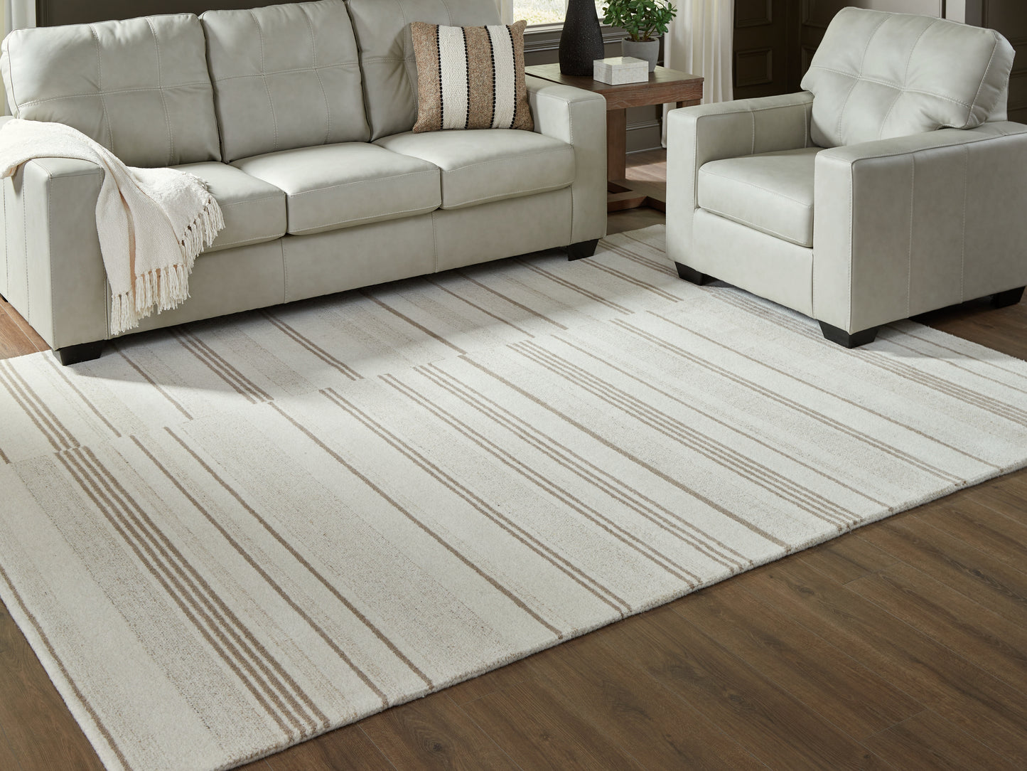 Cassel Furniture Outlet - Ashley Furniture - Gadence Rug - 7'8" x 10' Area Rug / Ivory/Tan - R407641