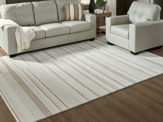 Cassel Furniture Outlet - Ashley Furniture - Gadence Rug - 7'8" x 10' Area Rug / Ivory/Tan - R407641