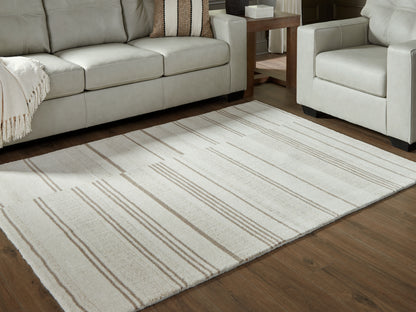 Cassel Furniture Outlet - Ashley Furniture - Gadence Rug - 5' x 7' Area Rug / Ivory/Tan - R407642