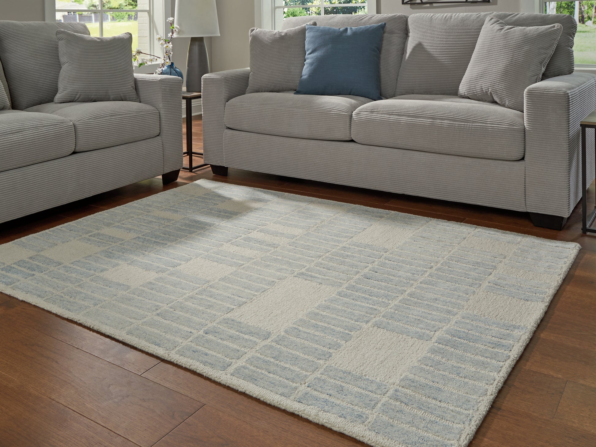 Cassel Furniture Outlet - Ashley Furniture - Dylanton Rug - 7'8" x 10' Area Rug / Ivory/Blue - R407811