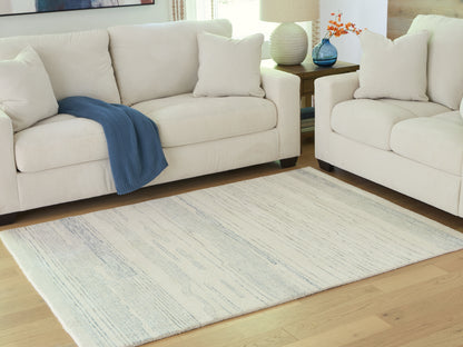 Cassel Furniture Outlet - Ashley Furniture - Genemost Rug - 5' x 7' Area Rug / Ivory/Blue - R407842