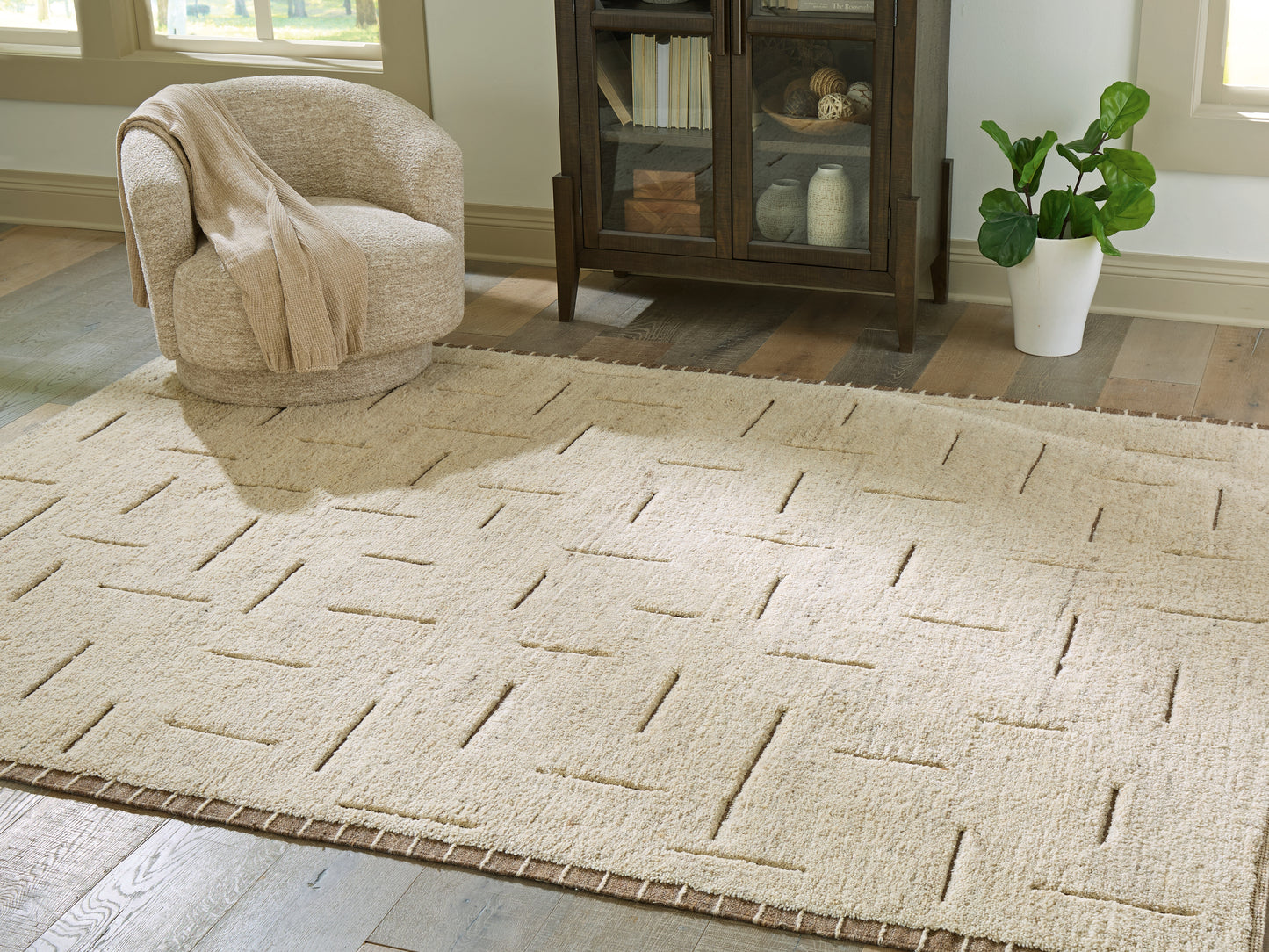 Cassel Furniture Outlet - Ashley Furniture - Clayman Rug - Large Rug / Beige/Brown - R408341